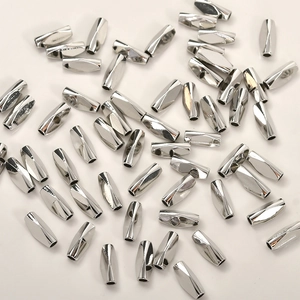 Close-up of faceted silver plated copper tubes for DIY handmade jewelry crafting