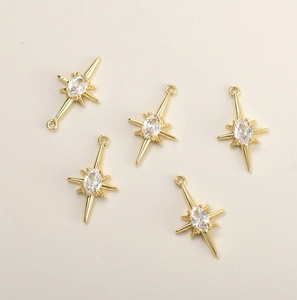 Five 14k gold plated starburst pendants with sparkling zircon for DIY jewelry making