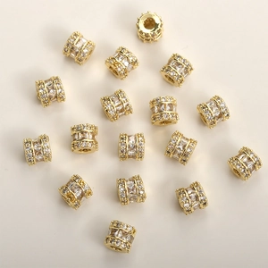 Detailed view of 14k gold plated waist spacer beads with sparkling zircon inlay for DIY