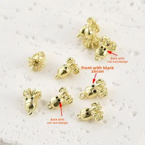 Détail du pendentif pieuvre avec yeux en zircon noir et dos évidé en finition or 14k