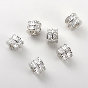 Detailed view of silver tone cubic zirconia barrel beads for DIY jewelry making