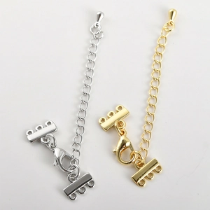 Detail van 18k goud en zilver karabijnsluitingen met meerrijige connectoren voor DIY sieraden