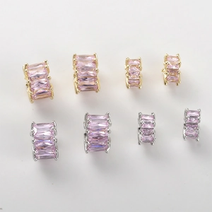 Detail of pink zircon spacer beads with 14k gold and silver plating for DIY jewelry