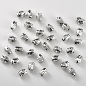 Textured 14k gold plated barrel beads for handmade jewelry making in bright silver finish