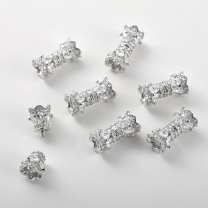 Macro detail of silver plated 14k gold screw clasp with cubic zirconia for DIY jewelry