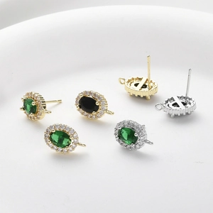 Oval emerald and black diamond stud earrings in 14k gold plated copper with silver needle