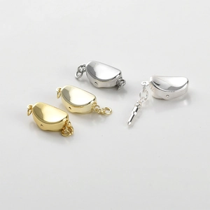 Close-up of 14k gold-plated and silver jewelry clasps for DIY necklace making
