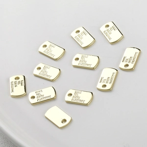 Polished 14k gold-plated rectangular ID tags with engraved pet and health details