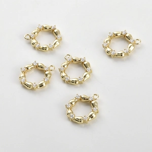 Set of five 14k gold-plated twisted round charms with inlaid white zircon stones for jewelry DIY