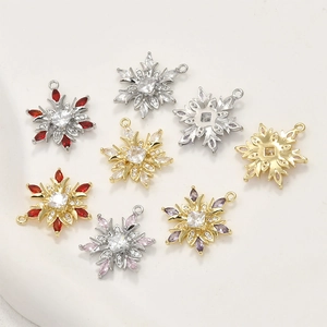 Close-up of snowflake charms with colorful cubic zirconia for jewelry making