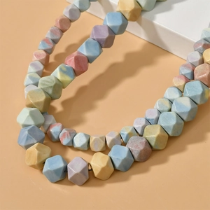 Rainbow faceted geometric beads in macabre colors for DIY jewelry making
