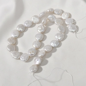Close-up of flat natural freshwater baroque pearls with lustrous finish for DIY jewelry