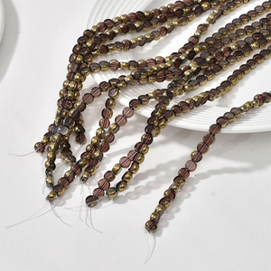 Flat round lavender crystal beads with gold trim for DIY jewelry making and craft projects