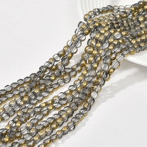 Detail of 6mm faceted crystal glass beads and gold plated spacers for DIY jewelry