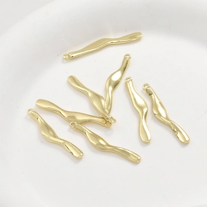 Detailed view of 14k gold-plated wavy bar pendants for handmade DIY jewelry crafts