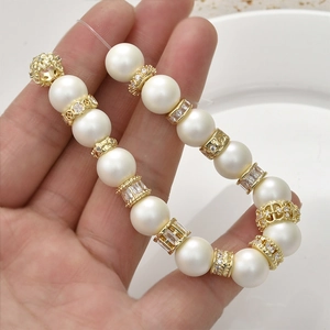 Handmade bracelet with 14k gold plated spacer beads and large white pearls