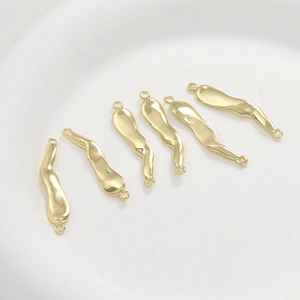 Detailed view of 14k gold-plated wavy brass link connectors for DIY jewelry making