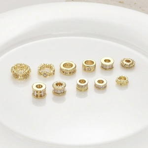 Variety of 14k gold-plated spacer beads with zircons for DIY jewelry making