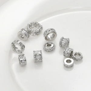 Macro shot of silver plated spacer beads with cubic zirconia for DIY jewelry making
