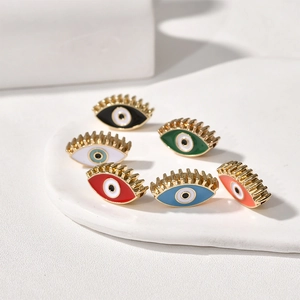Makroaufnahme bunter Böser Blick Legierung Perlen mit goldenen Wimpern für DIY-Schmuck