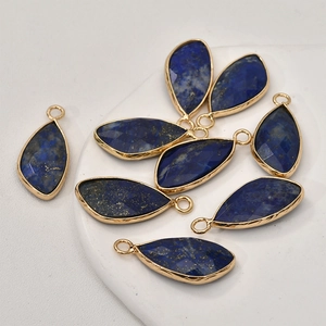 Faceted leaf-shaped blue lapis stones with gold-plated edges for DIY jewelry making