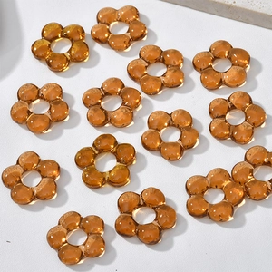 Macro shot of amber glazed flower petals with hollow holes for DIY jewelry making