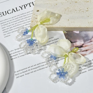 Detail of sweet chiffon bow and crystal flower handmade pendant for DIY earrings
