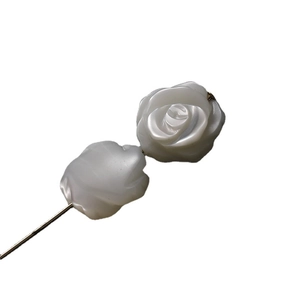 Elegant white rose brooch with dual carved flower design and gold-tone long needle pin