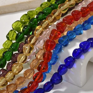 Close-up of colorful irregular glass beads for DIY jewelry and beaded accessories