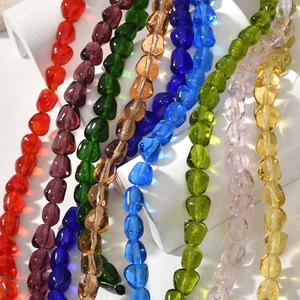 Macro shot of colorful baroque style irregular glass beads for DIY jewelry making