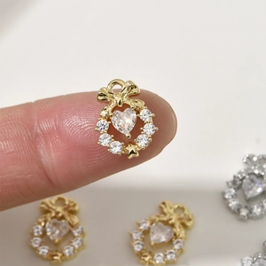 Ciondoli a cuore con fiocco in zircone oro e argento per creazione gioielli fai da te