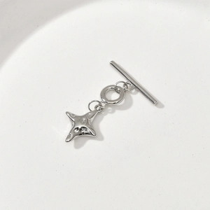 Macro shot of silver liquid-style star pendant with T-bar clasp for jewelry making