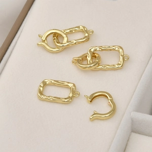 Detail of 14k gold plated textured toggle clasps for jewelry making DIY supplies