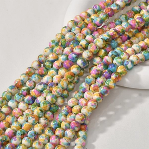 Macro shot of 8mm colorful oil painting style marble texture beads for jewelry making