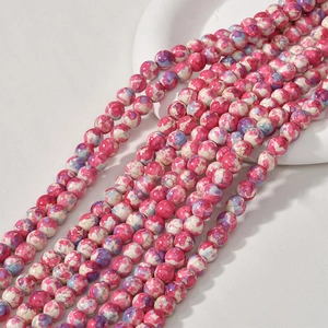 Detailed view of pink and purple oil painting style 8mm round marble texture beads
