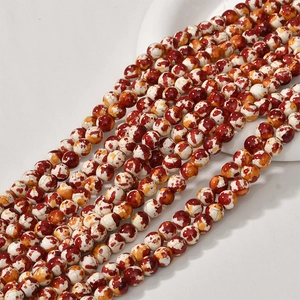 Detail of 8mm oil painting style turquoise beads with red and orange marble texture