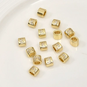 Detail of 14k gold-plated alphabet charm with sparkling zircon and 925 stamp