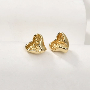 Pair of 14k gold plated lava-textured heart stud earrings with irregular concave design