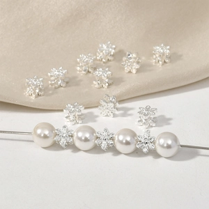 Silver plated floral spacer beads and glossy white pearls for DIY jewelry making