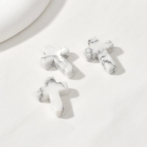 Three white turquoise cross pendants for DIY jewelry making with marble textures