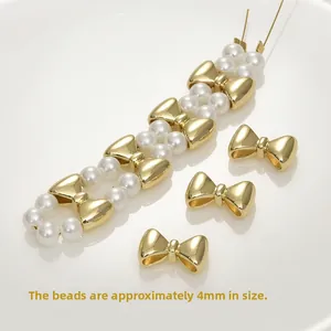 14k gold plated bow spacers with 4mm shell pearls for handmade jewelry making