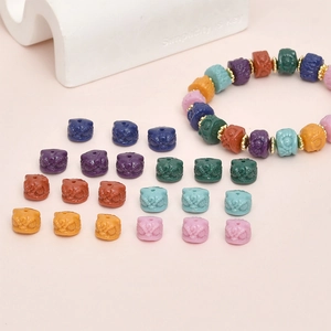Colorful lion head beads for DIY jewelry making featuring vibrant resin charms