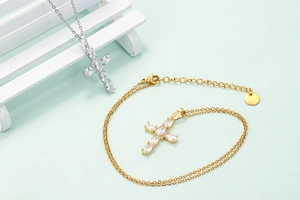 Hip-hop cross pendant necklace in gold and silver with shimmering marquise cubic zirconia