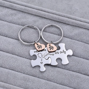 Matching couple's puzzle keychain set with Her One and His Only engraving and tree of life