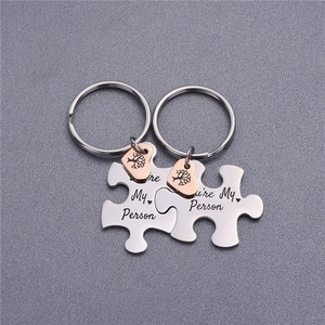 Couples stainless steel puzzle keychain set with You are My Person engraving and heart