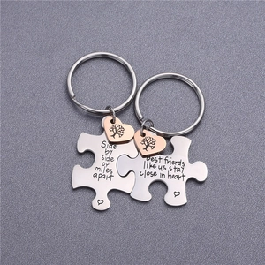 Custom puzzle piece keychain set with rose gold hearts and friendship quotes for best friends