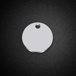 Polished silver stainless steel round tag with 14mm graduation cap engraving on black background