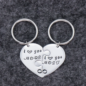 Polished stainless steel puzzle heart keychain with 'I LOVE YOU' engraving for couples