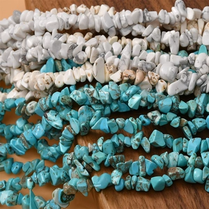 Close-up of irregular turquoise and howlite gemstone beads for DIY jewelry making