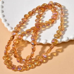Amber heart-shaped crystal glass beads with iridescent AB coating for DIY jewelry